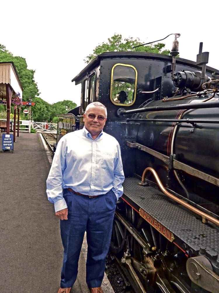 Tender moments: Shaun Dewey, general manager of the Kent & East Sussex Railway, with No. 376 Norwegian at Tenterden station on August 13. The 2-6-0, built in 1919 by the Swedish firm Nyquist & Holm for the Norwegian State Railway, was brought to the UK in 1971 after being purchased privately, and is the only tender locomotive on the KESR. GEOFF COURTNEY 